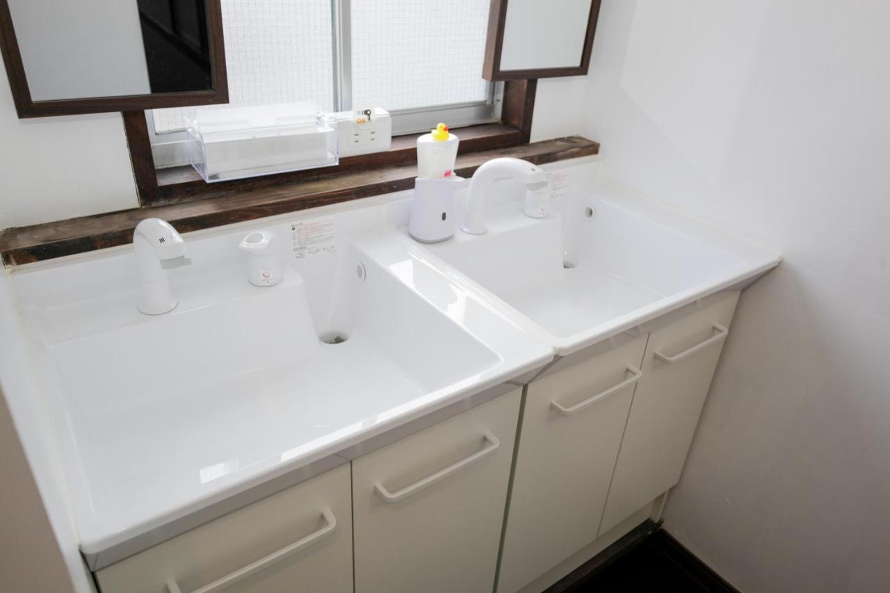 Отель Sansan Yuzawa Backpackers Экстерьер фото