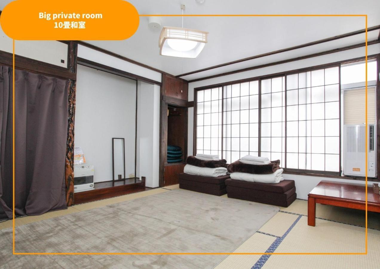 Отель Sansan Yuzawa Backpackers Экстерьер фото